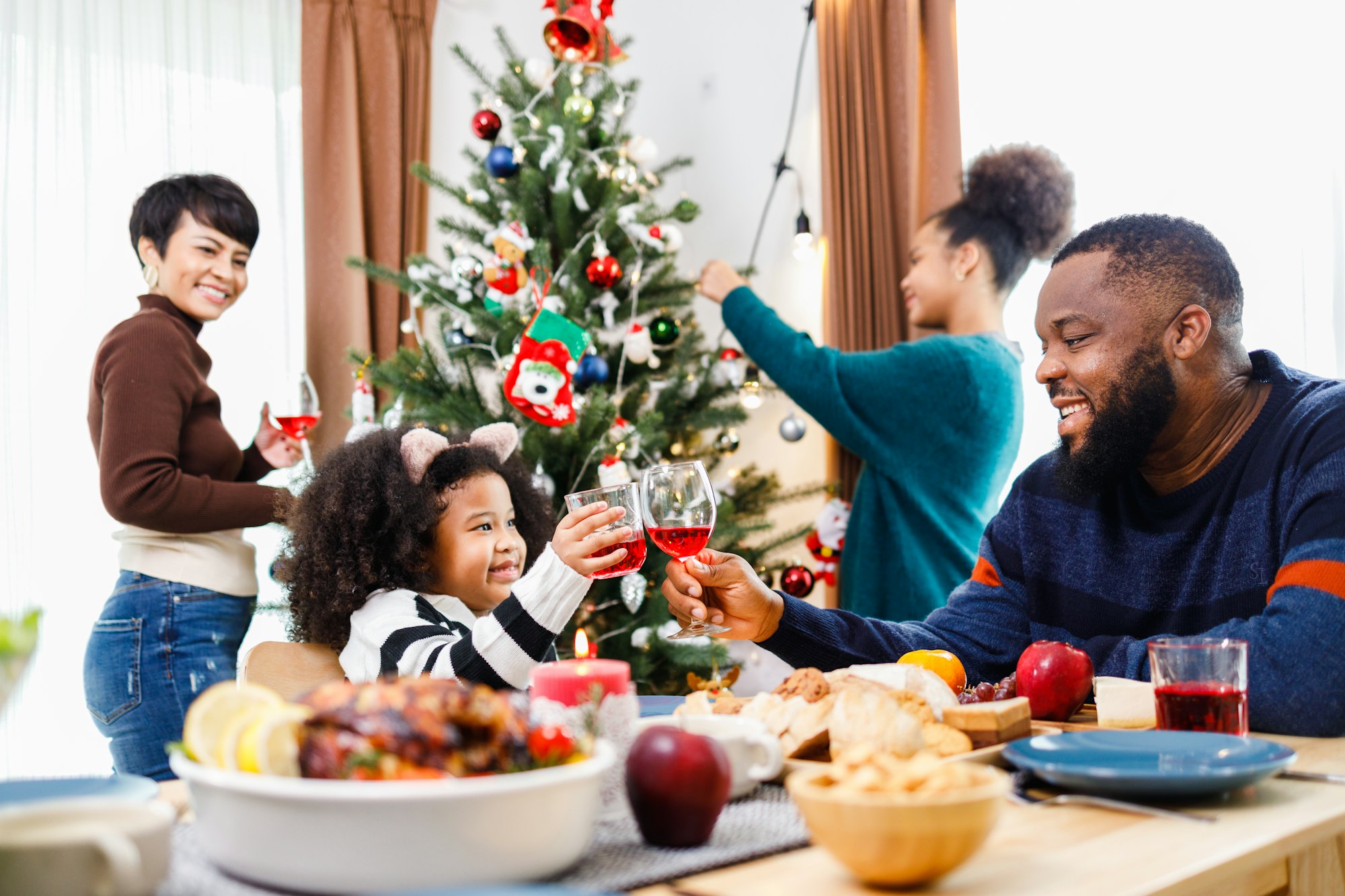 Happy New Year, Happy African American family dinner at home